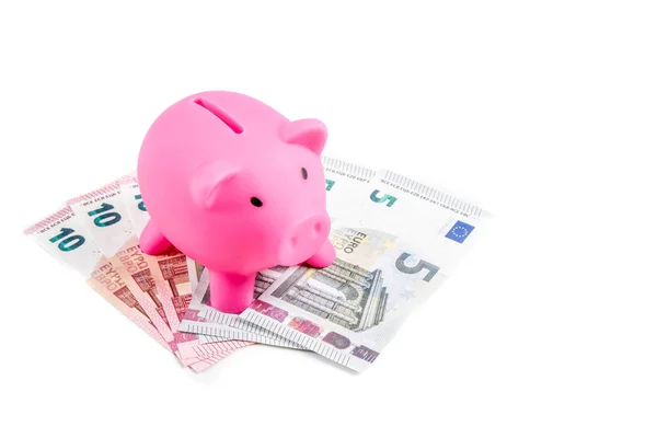 Piggy bank with euro banknotes — Stock Photo, Image