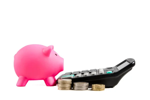 Piggy bank with a calculator — Stock Photo, Image