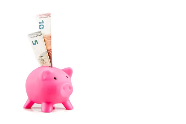 Piggy bank met vijf tot tien euro-bankbiljetten — Stockfoto
