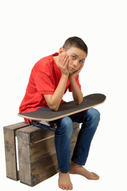 Onun kaykay ile genç beyaz genci