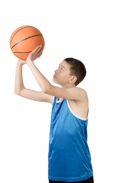 Young caucasian teenage boy with a basketball — Stock Photo, Image