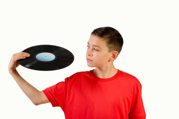 Joven caucásico adolescente sosteniendo un vinilo lp —  Fotos de Stock