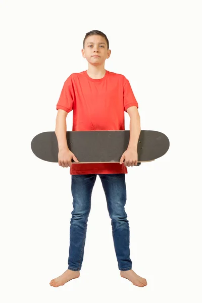 Mladý dospívající kavkazské chlapce s jeho skateboard — Stock fotografie