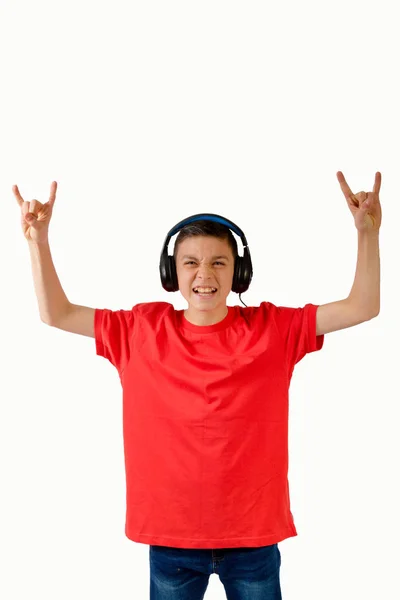 Young caucasian teenage boy listening to music Stock Image