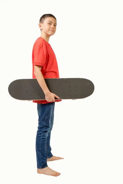 Remaja muda Kaukasia anak dengan skateboard nya — Stok Foto