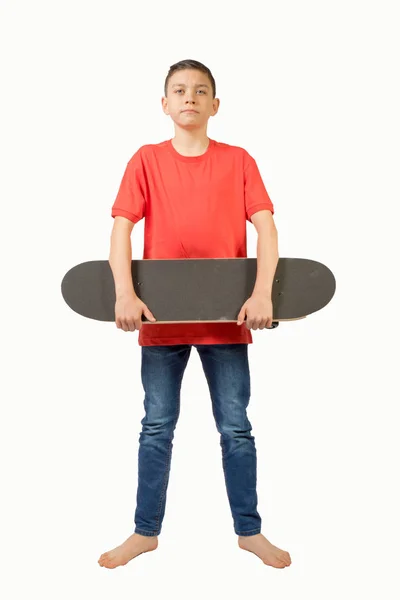 Remaja muda Kaukasia anak dengan skateboard nya — Stok Foto