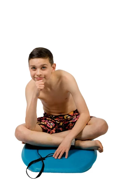 Jovem adolescente caucasiano menino com seu corpo bordo — Fotografia de Stock