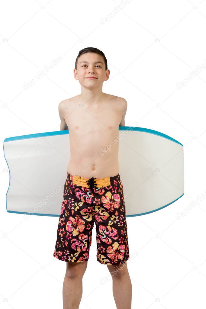 Young teenage caucasian boy with his body board