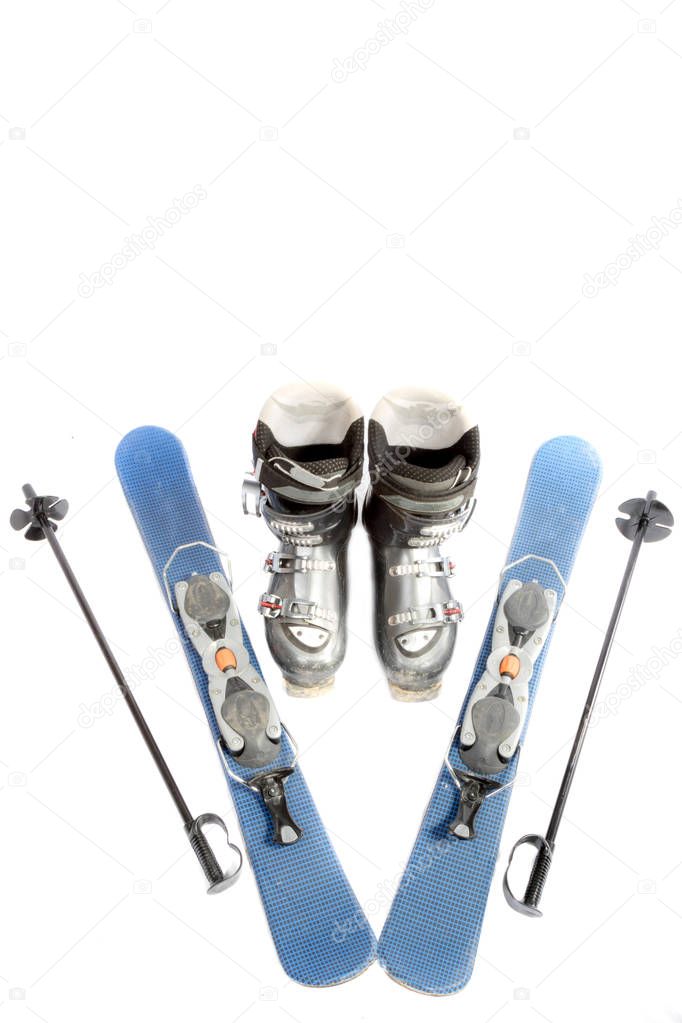 Ski boots, blades and poles