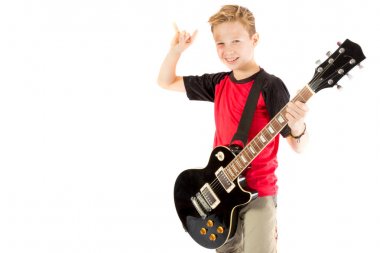 Pre-teen çocuk ve bir elektro gitar