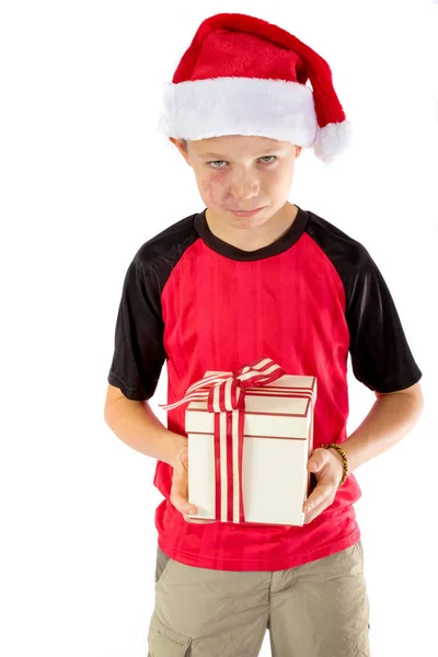 Pre-adolescente chico con un regalo de Navidad —  Fotos de Stock