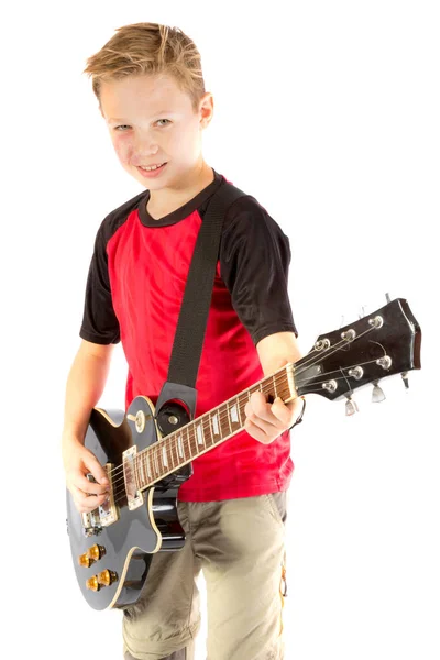 Pre-dospívající chlapec a elektrická kytara — Stock fotografie