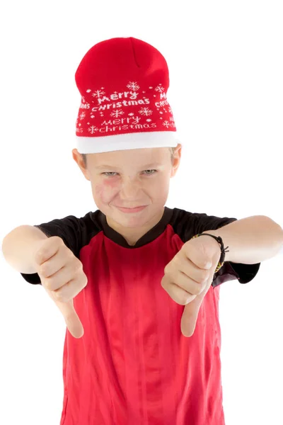Pre-teen jongen dragen een kerstmuts — Stockfoto