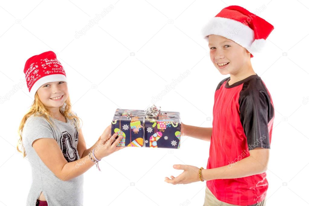 Siblings exchange a christmas present