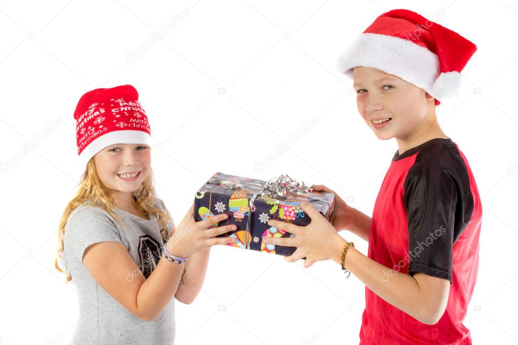 Siblings exchange a christmas present