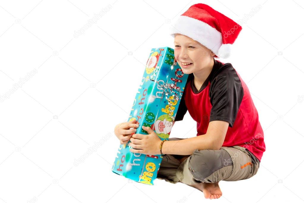 Pre-teen boy with a christmas gift