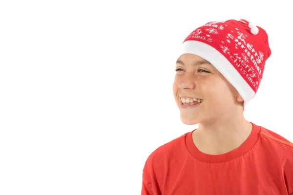 Menino adolescente feliz usando um chapéu de Natal — Fotografia de Stock