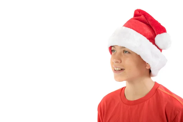 戴着圣诞帽的快乐少年男孩 — 图库照片