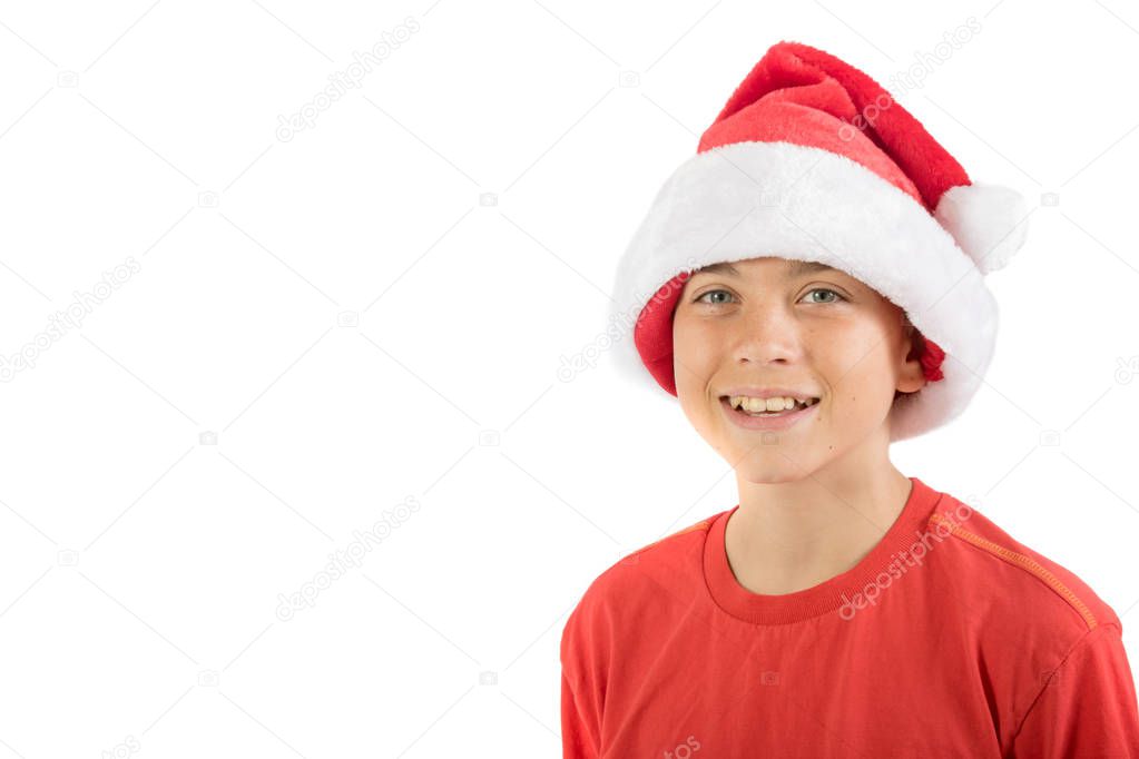 Happy teenage boy wearing a Christmas hat