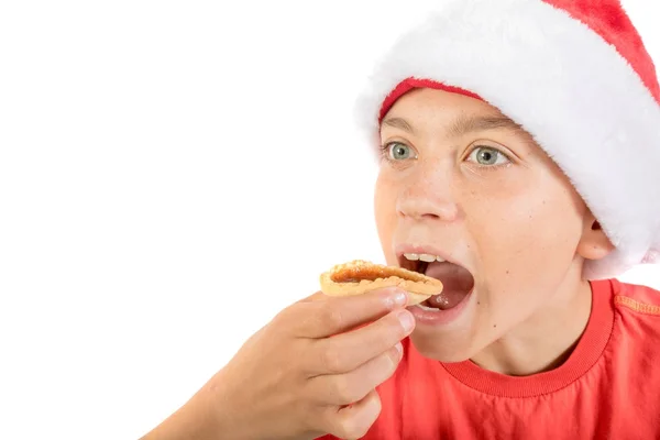 Ragazzo adolescente isolato su sfondo bianco con una crostata di marmellata — Foto Stock