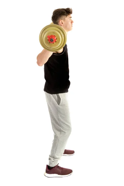 18 year old teenage boy exercising with weights — Stock Photo, Image