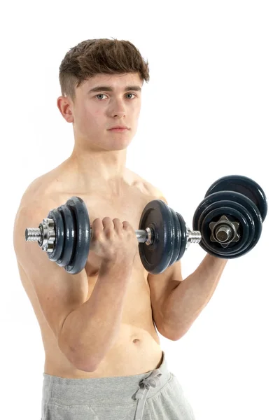 18 éves tinédzser fiú, súlyemelés — Stock Fotó