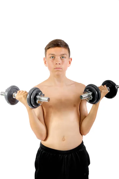 Adolescente haciendo ejercicio con pesas — Foto de Stock