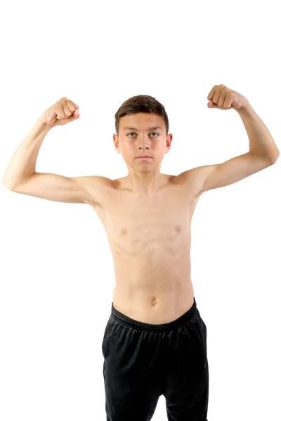 Shirtless adolescente flexing sus músculos — Foto de Stock