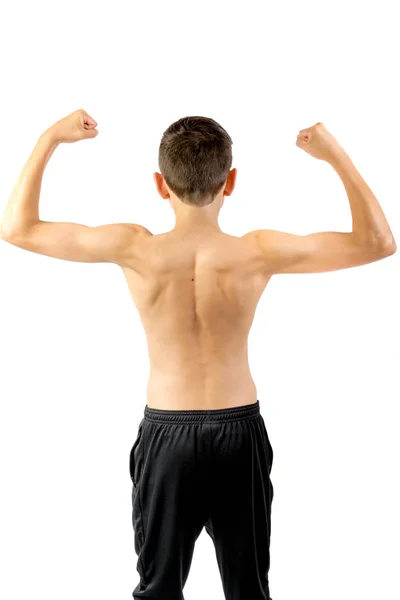 Shirtless adolescente menino flexionando seus músculos das costas — Fotografia de Stock