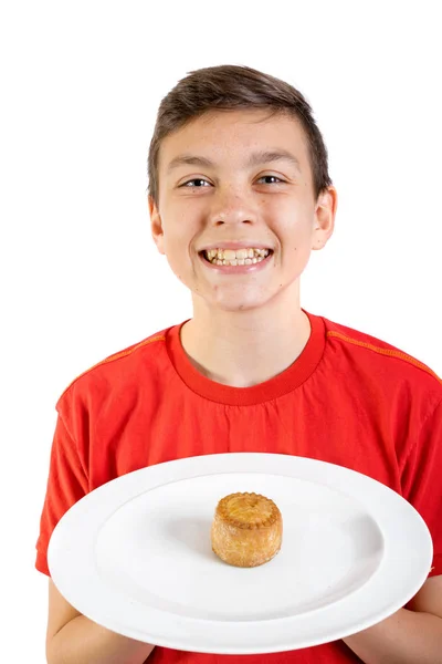 Kaukázusi fiatal tizenéves fiú a pork pie — Stock Fotó