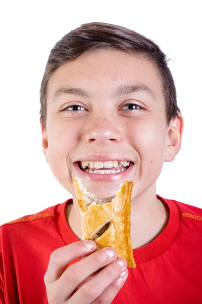 Jovem caucasiano adolescente com um rolo de salsicha — Fotografia de Stock