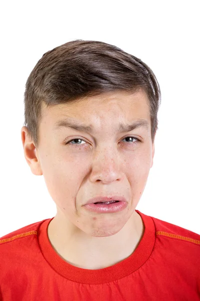 Young caucasian teenage boy doesn't like a food — Stock Photo, Image