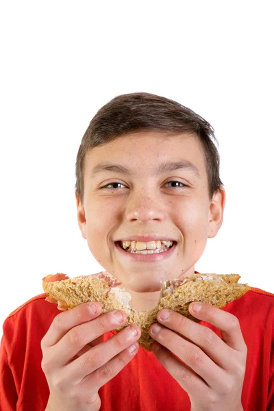 Jovem caucasiano adolescente com um sanduíche — Fotografia de Stock