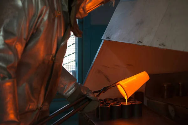 Smelting gold at a factory