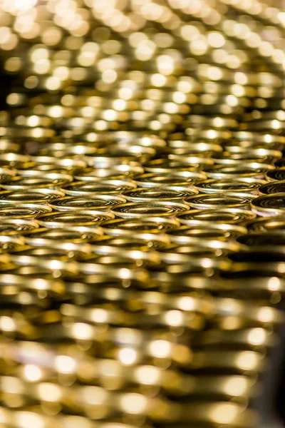 Many golden cans — Stock Photo, Image