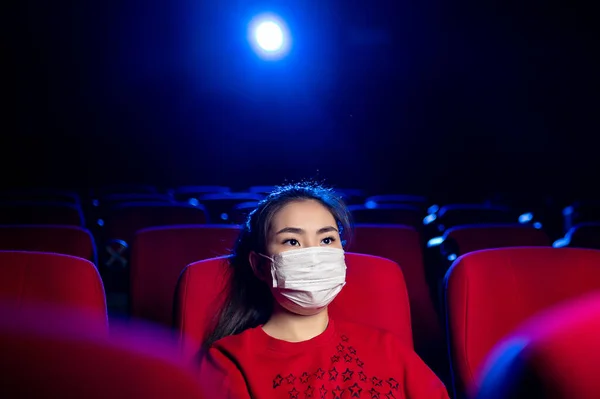 sick person cinema mask watch movie public virus