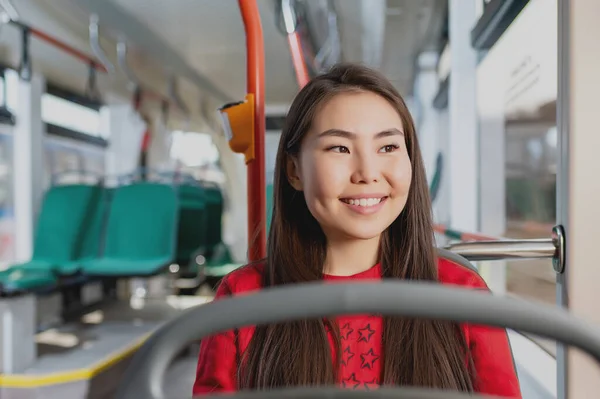 asian passenger tramway travel portrait happy student