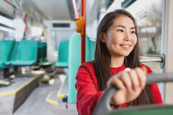 asian passenger tramway travel portrait happy student