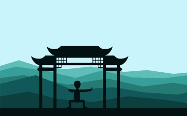 Adam akşam Çigong veya taijiquan çalışmaları gerçekleştirme.