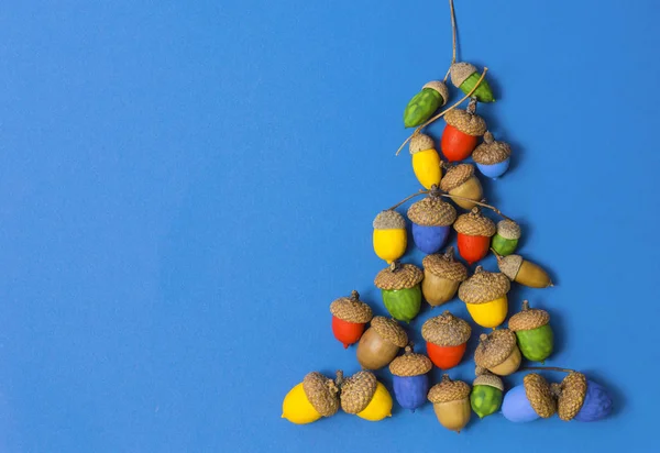 Merry christmas and happy new year CARD background handmade handicraft colored acorns christmas-tree. — Stock Photo, Image