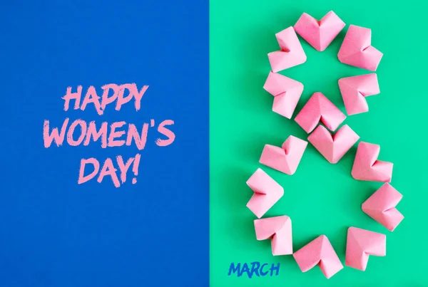 Boldog nemzetközi női napot ünnepelni március 8 kártya rose színes papír szív alakú nyolcas 8 színes háttér — Stock Fotó