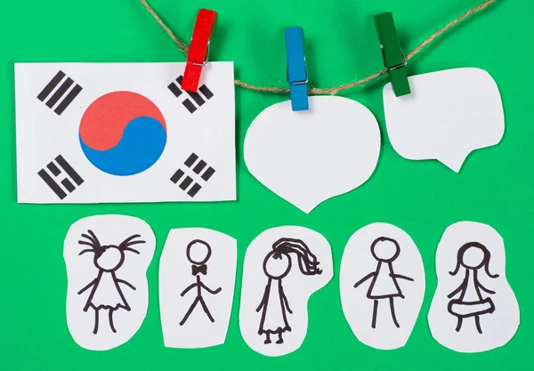 Paper people with  dialog speech bubbles and South Korea flag hanging pegs. Social networking concept. March 1st Movement celebrated march 1 — Stock Photo, Image