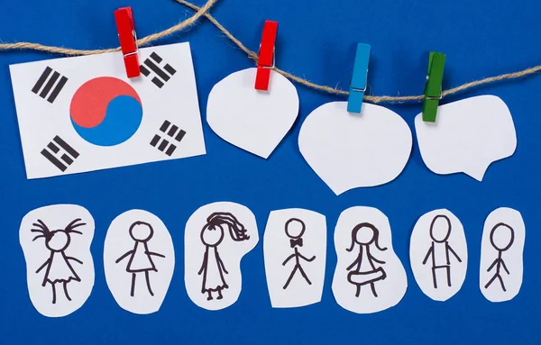 Paper people with  dialog speech bubbles and South Korea flag hanging pegs. Social networking concept. March 1st Movement celebrated march 1 — Stock Photo, Image