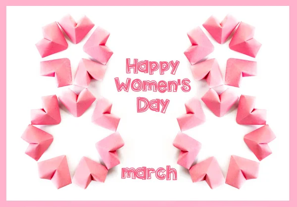 Ευτυχισμένη ημέρα διεθνούς Womens γιορτάζουν στις 8 Μαρτίου κάρτα χαρτί χρώμα ροζ καρδιές σχήμα σχήμα οκτώ 8 για το χρώμα φόντου — Φωτογραφία Αρχείου