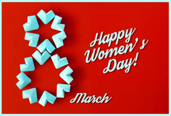 Fröhliche internationale Frauentag feiern am 8. März Karte. rosafarbene Papierherzen formen Figur acht 8 auf farbigem Hintergrund — Stockfoto