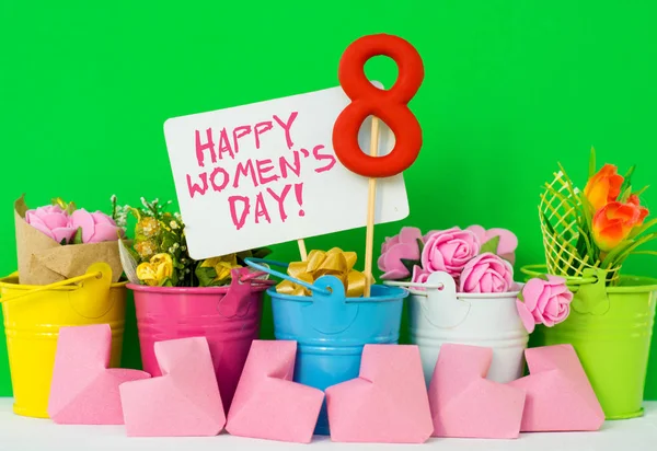 Tarjeta del Día de la Mujer Feliz. celebrar 8 Marzo, forma de piruleta figura ocho 8, nota para el texto, flores en cubos de colores . —  Fotos de Stock