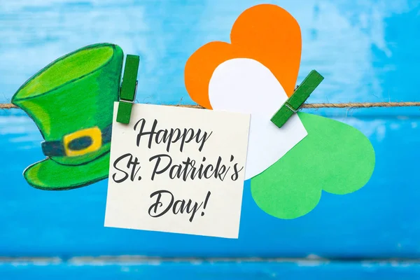 Happy St. Patrick\'s Day card with holiday attributes