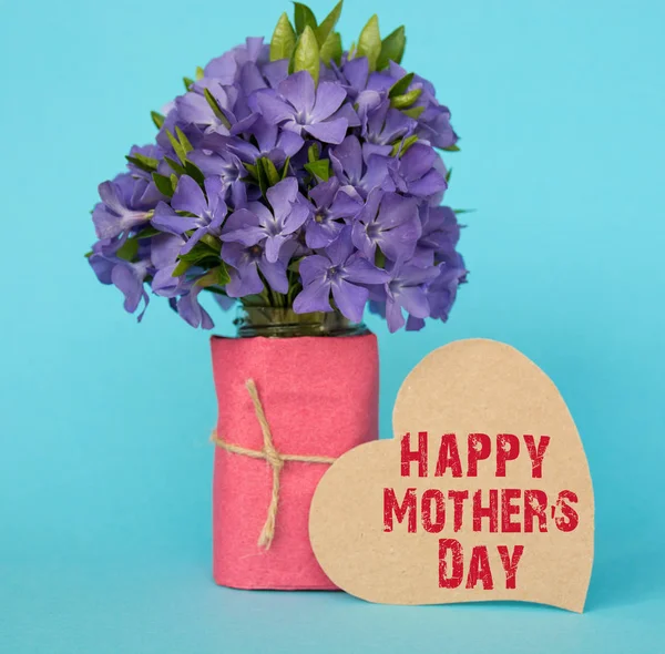 happy mother\'s day card. bouquet of blue flowers, a place with text