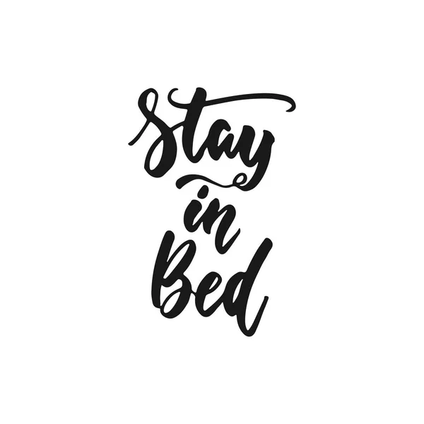 Stay in bed - hand drawn lettering phrase isolated on the white background. Fun brush ink inscription for photo overlays, greeting card or print, poster design. — Stock Vector