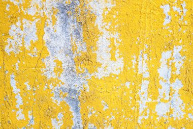 Beton sarısı duvar yüzey dokusu. Yaşlanma etkisiyle soyut grunge parlak renk arkaplanı. Kopyalama alanı.